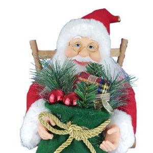 Figurine de Papa Noel avec un cadeau dans les mains
